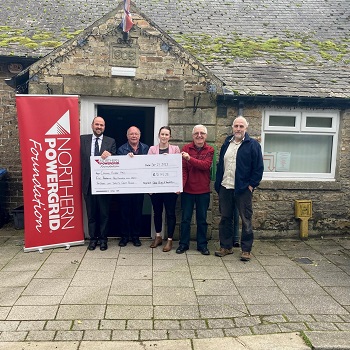 Community of Cowshill with Foundation cheque
