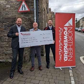 Westgate Village Hall receiving grant cheque from Northern Powergrid